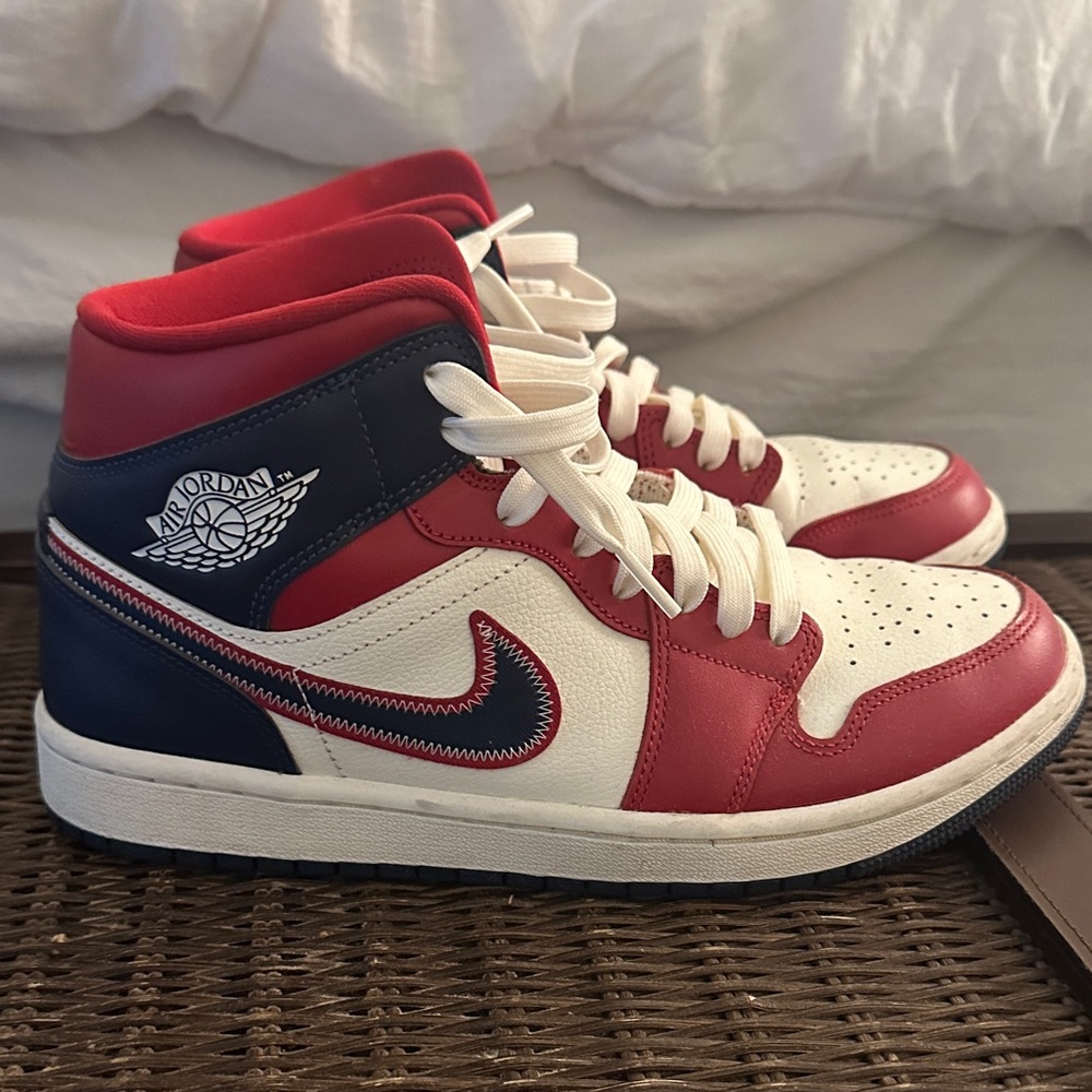 Nike Air Jordan Red, White, and Blue Sneakers